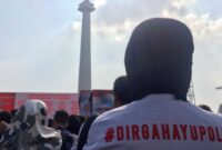 Pengunjung menghadiri perayaan HUT Bhayangkara ke-73 di Monumen Nasional (Monas), Minggu (7/7/2019). Foto: Antara

